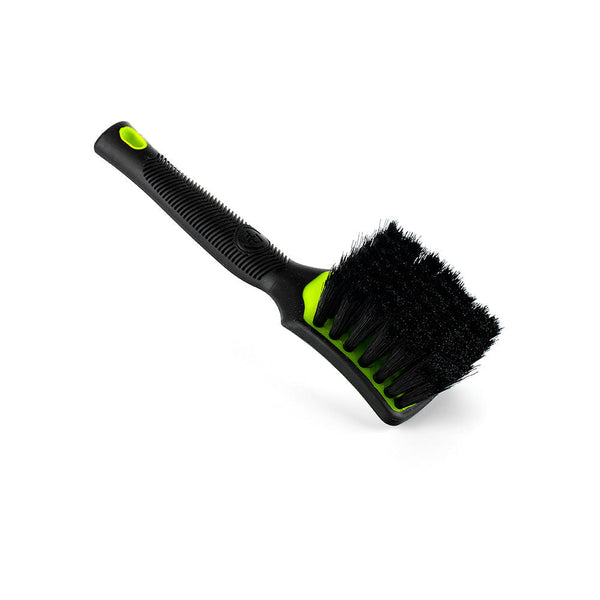 A green Detail Factory interior Scrub Brush on a white background.